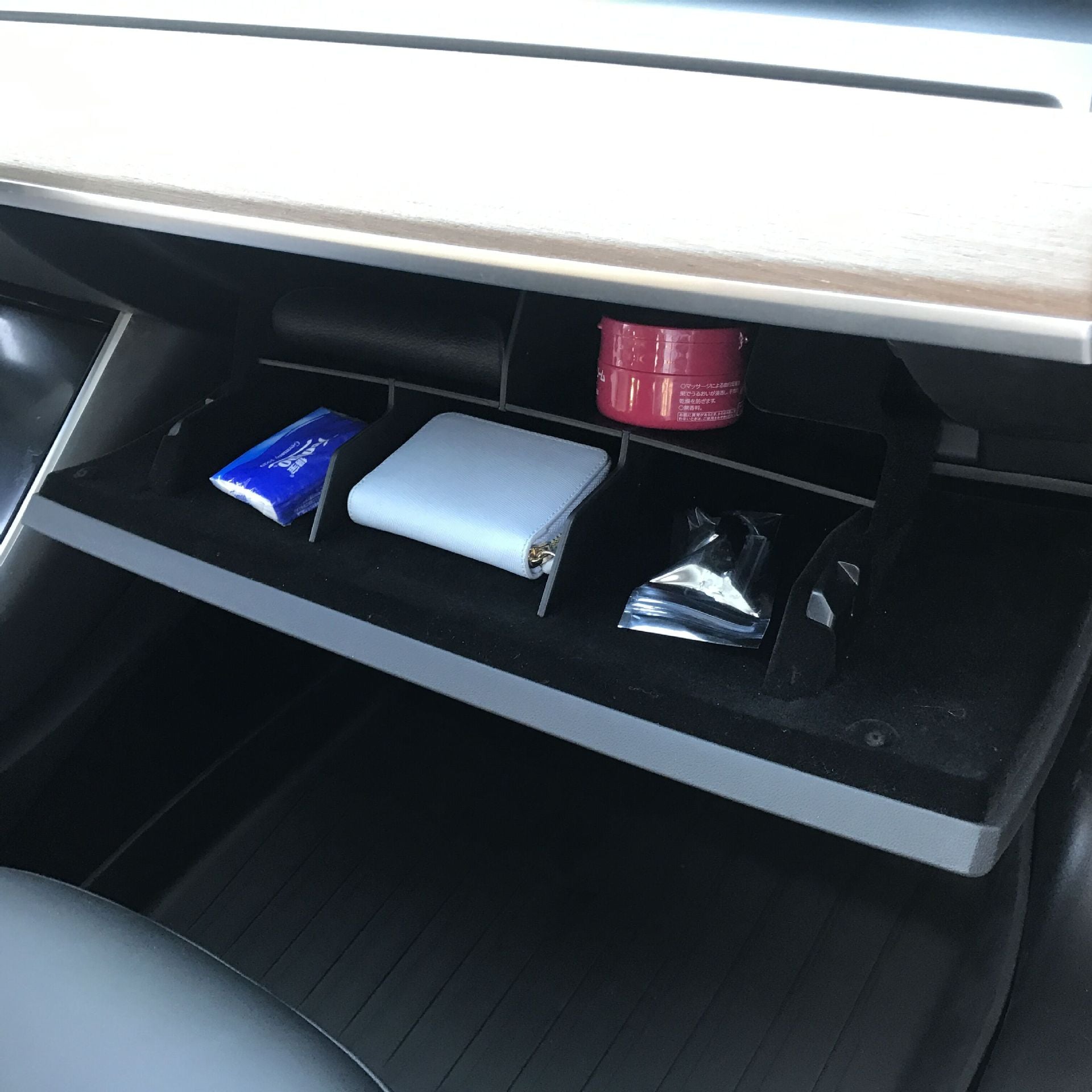 Tesla Model 3 passenger side glove box divider/storage organizer.