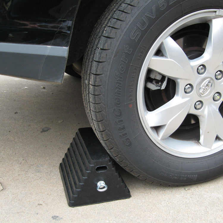 Rubber wheel stoppers for cars, trucks, airplanes, and aircraft; anti-slip triangular wooden wheel stops; ramp wheel stops.
