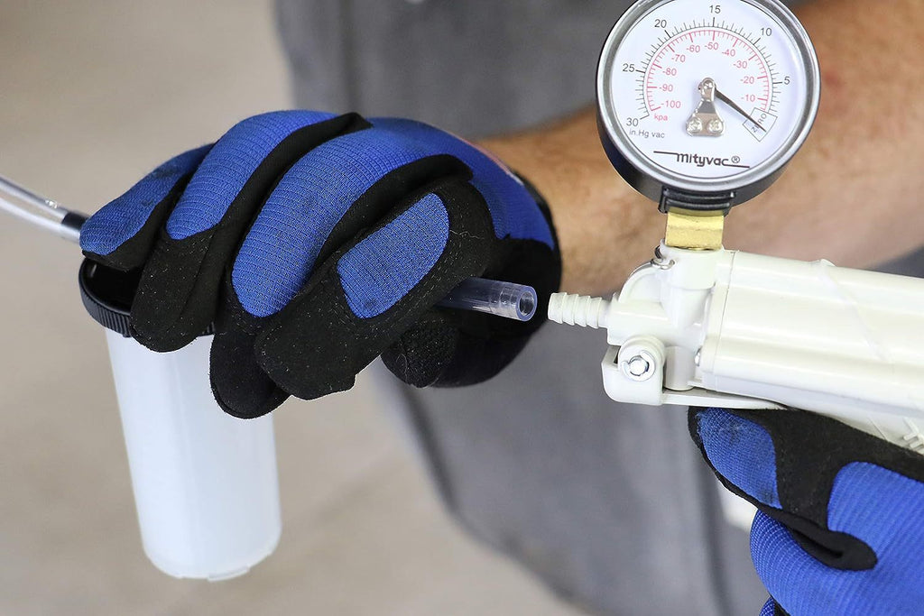 Manual vacuum oil pump test kit, pistol-type pressure tester, vacuum gauge, brake fluid discharge test.